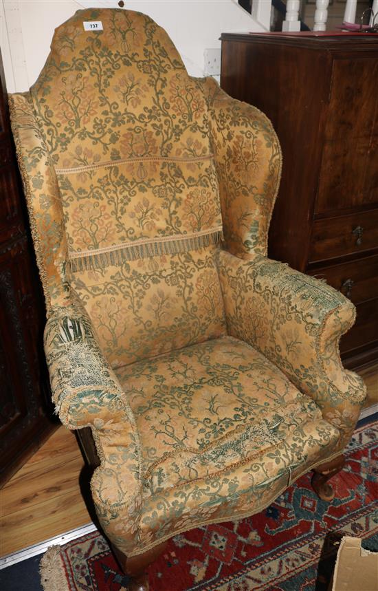 A Georgian style wing armchair